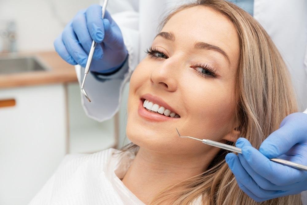 Dental examination in progress with dentist and patient
